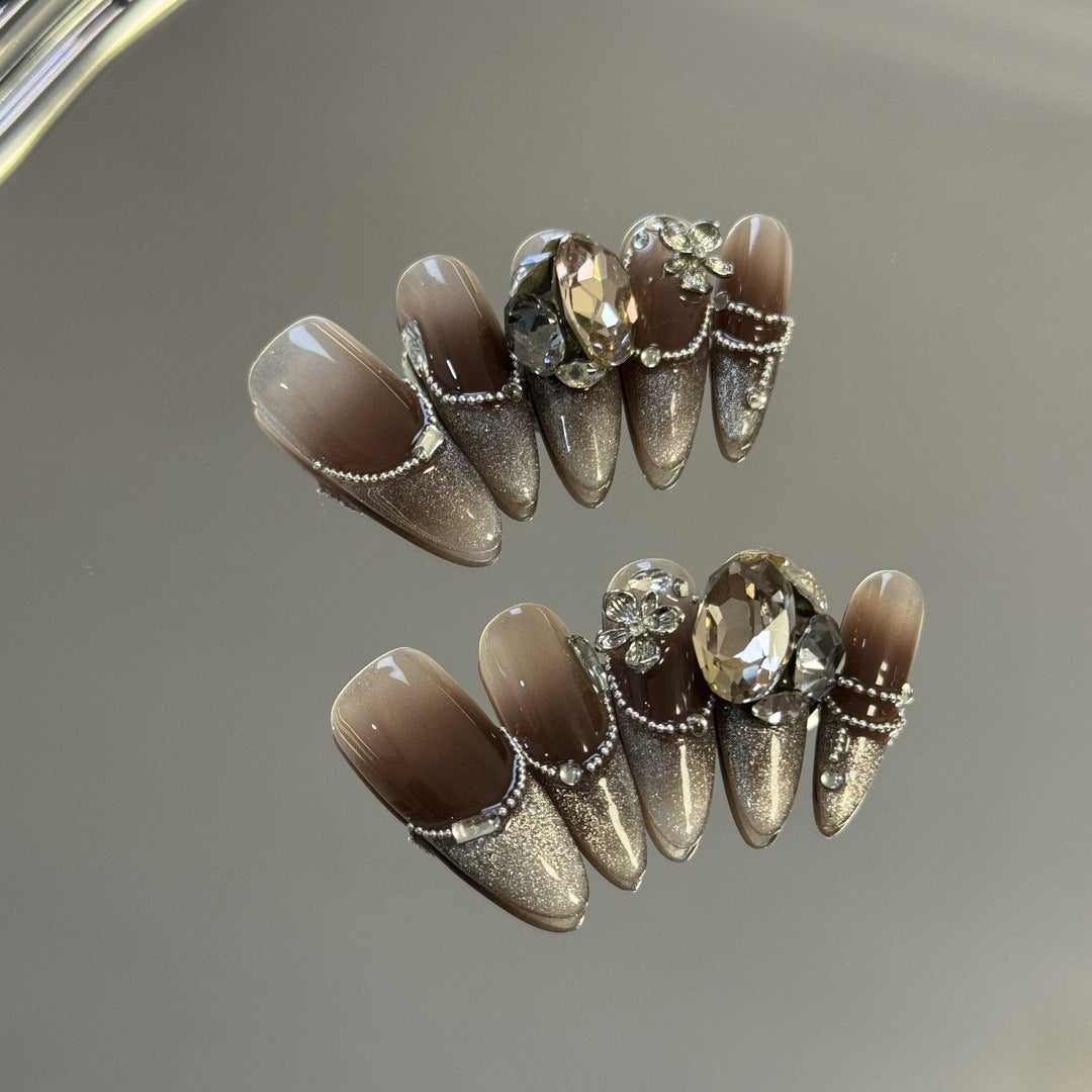 Faux ongles avec pierres précieuses œil de chat marron