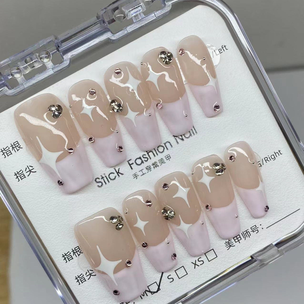 Faux ongles diamants étoiles à bords roses