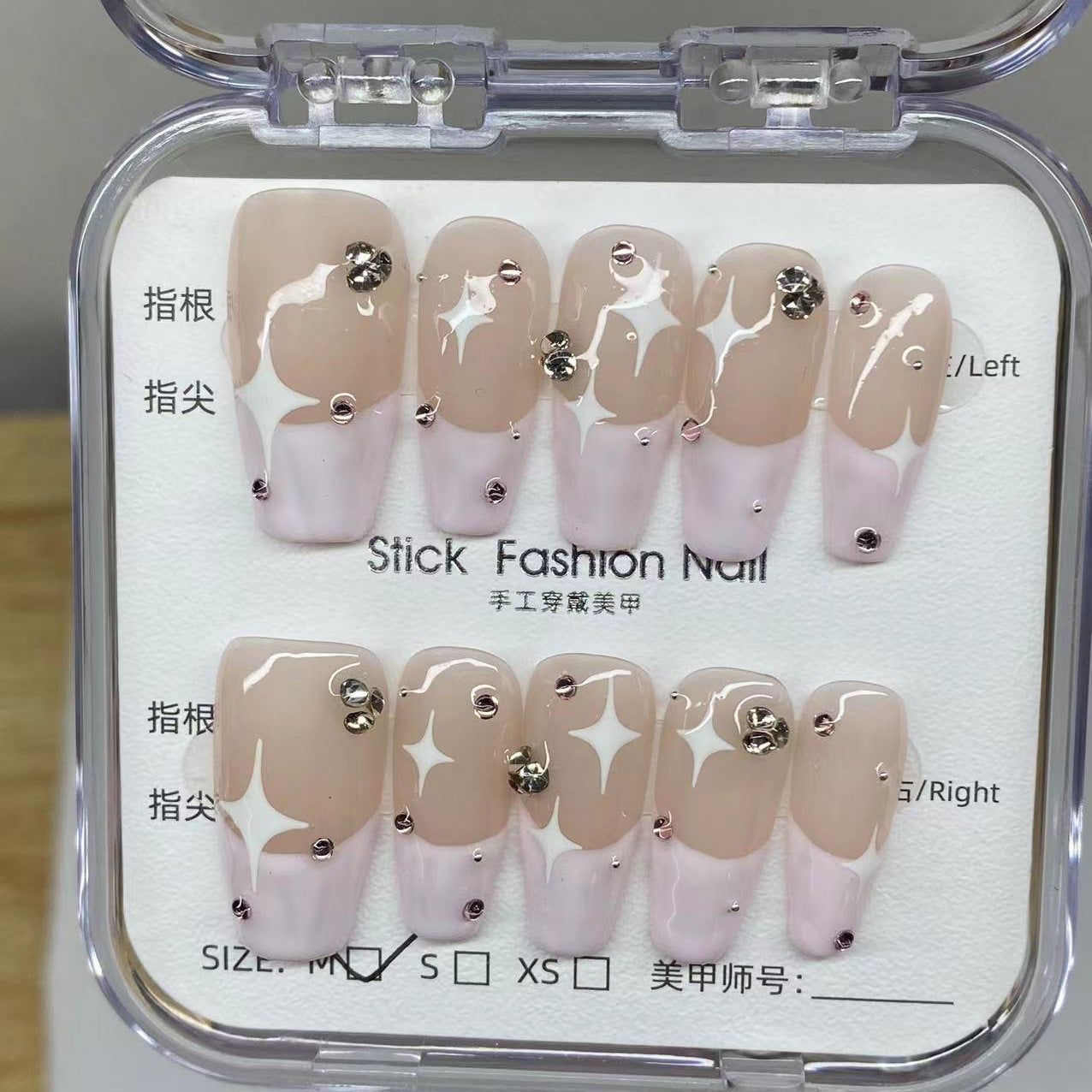Faux ongles diamants étoiles à bords roses